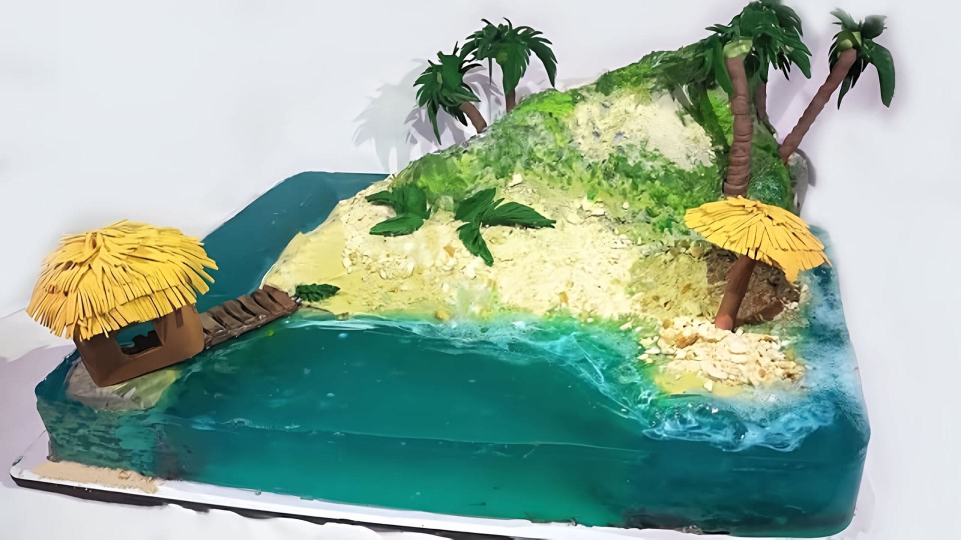 Видео-ролик с заголовком "Торт Острів / Торт з желе" представляет собой рецепт приготовления десерта, который сочетает в себе вкусный торт и желе