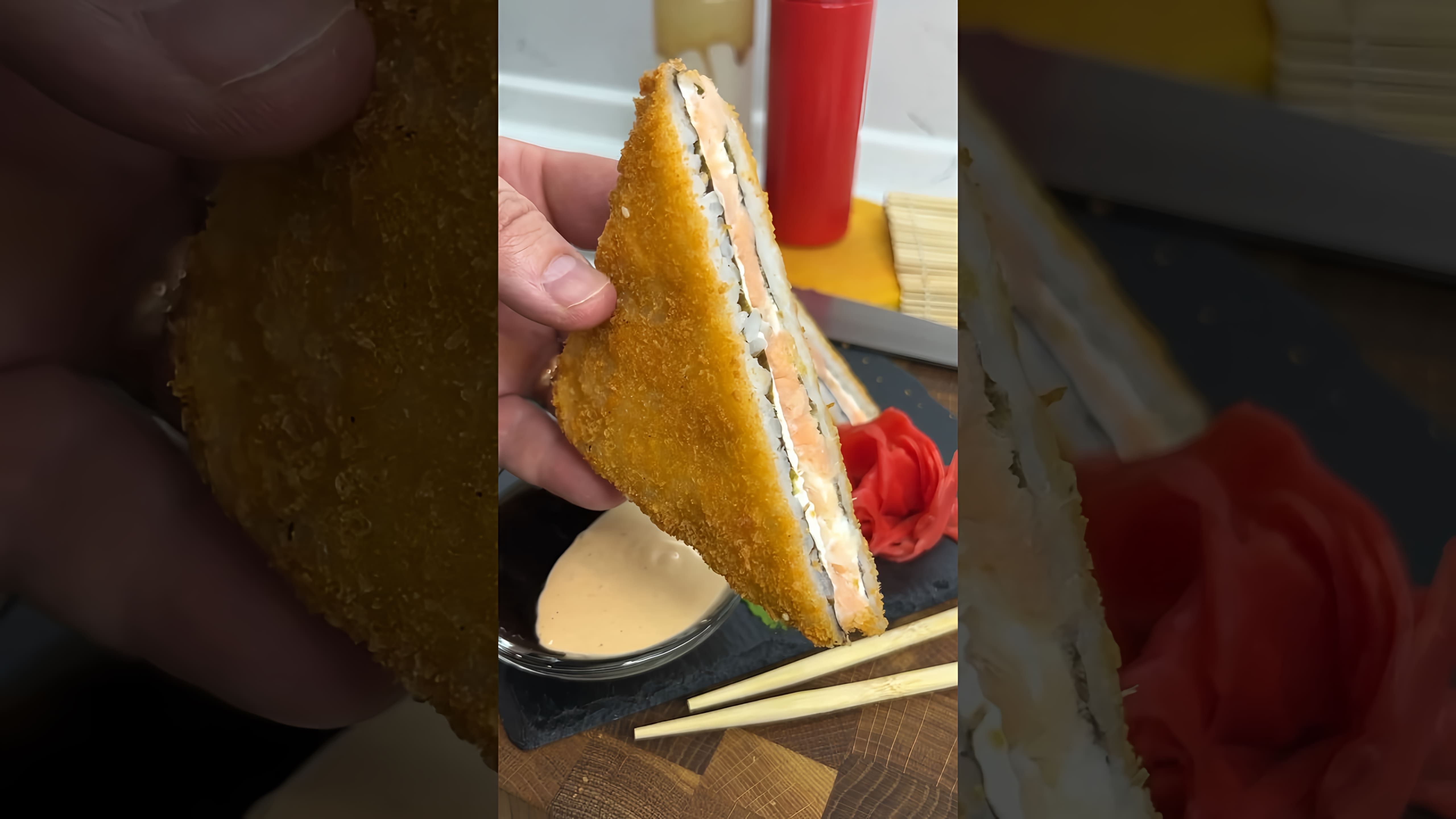 В этом видео демонстрируется, как приготовить суши сэндвич вместо традиционных японских роллов
