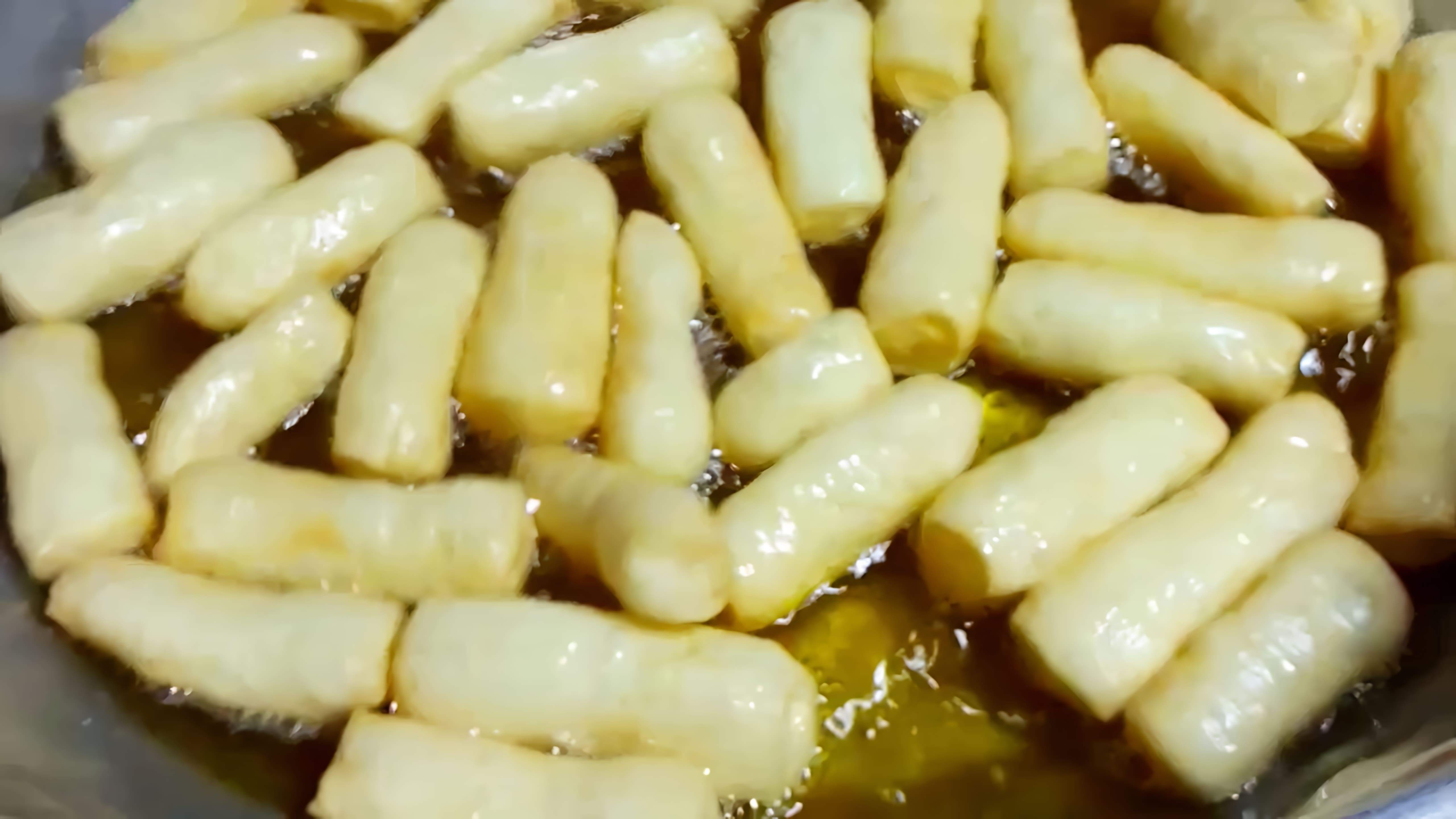 Рецепт татарского бавырсака - это видео-ролик, который демонстрирует процесс приготовления традиционного татарского десерта